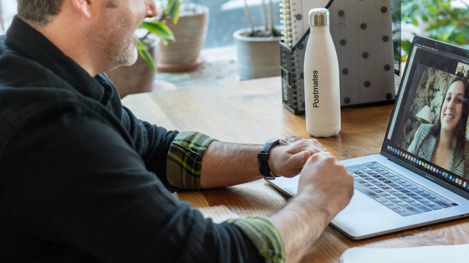 Remote worker on a video call at a desk