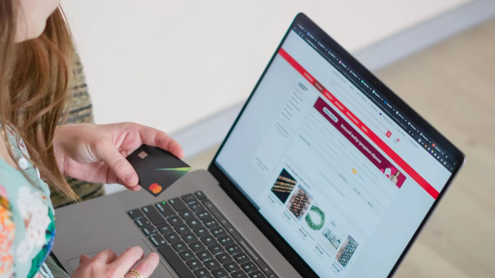 Paying by card while browsing listings on a laptop